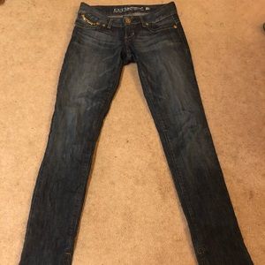 A pair of Guess Jeans